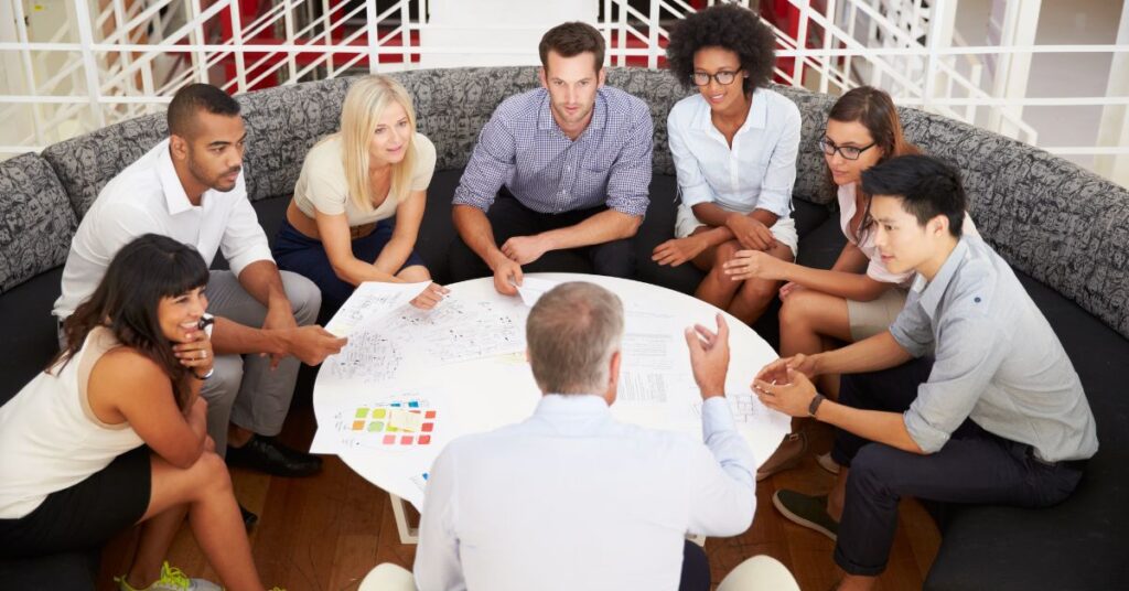 team gathered during meeting
